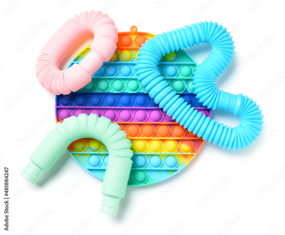 Colorful Pop Tubes and Pop it fidget toy on white background