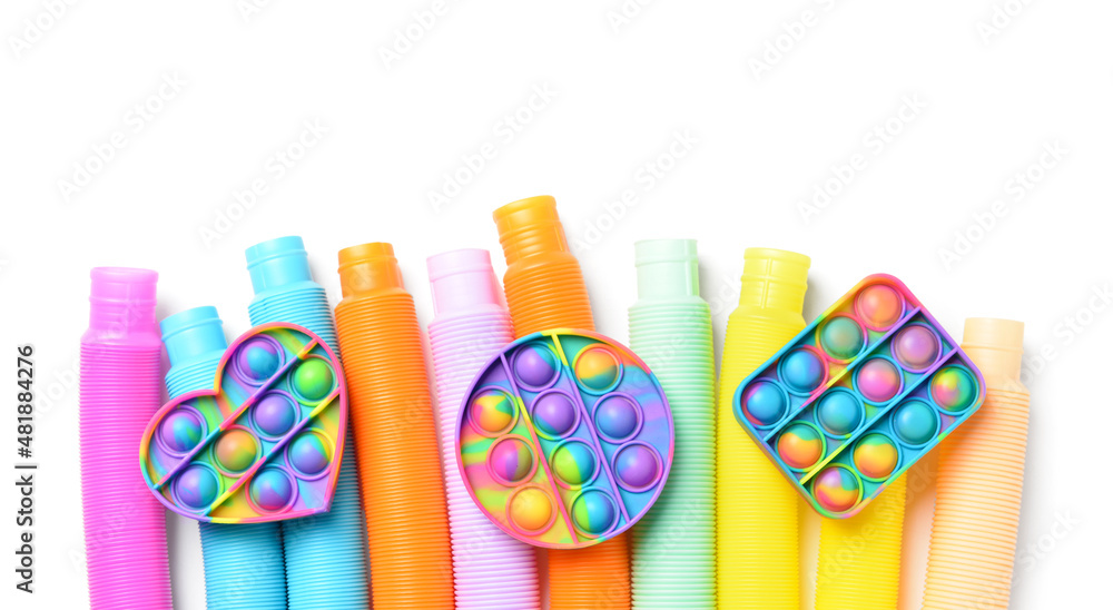 Colorful Pop Tubes and Pop it fidget toys on white background