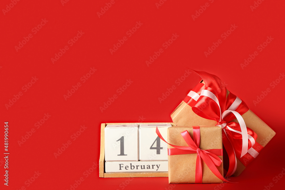 Calendar with date of February 14 and gifts on color background