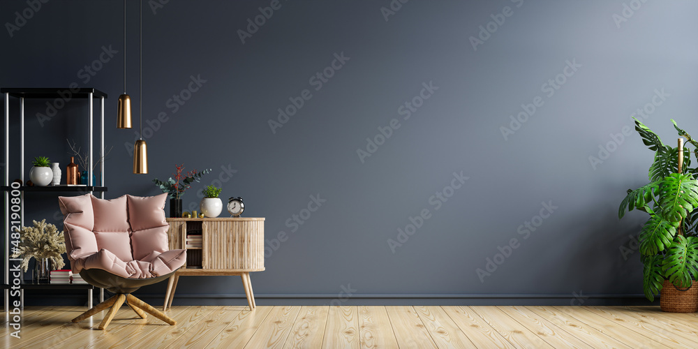 Dark blue living room interior with cozy luxury armchair on empty wall.