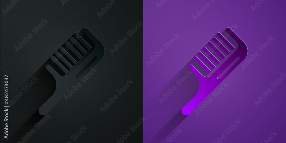 Paper cut Hairbrush icon isolated on black on purple background. Comb hair sign. Barber symbol. Pape