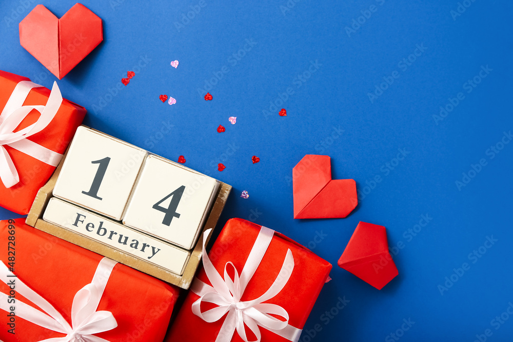 Calendar with date of February 14, hearts and gifts on color background