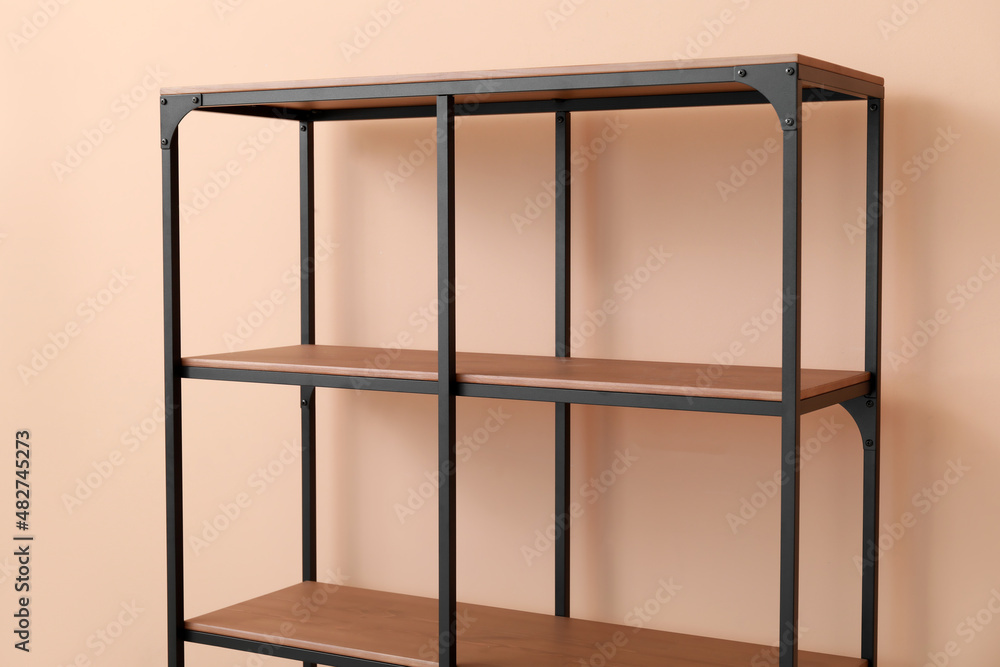 Empty modern shelf unit near color, closeup