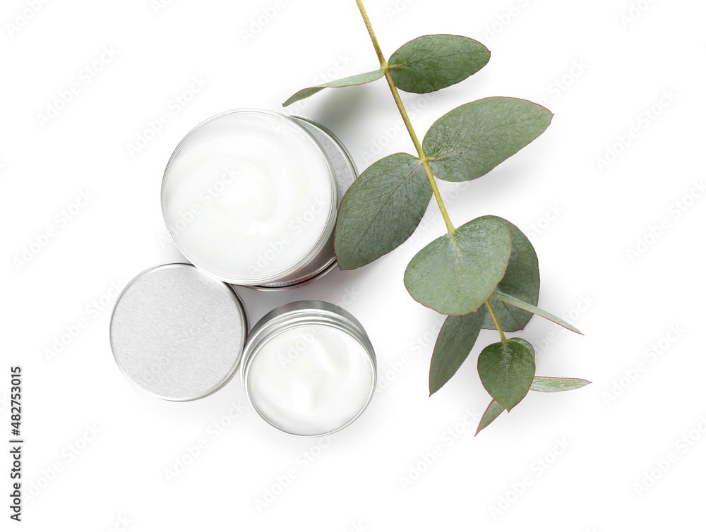 Jars with natural cosmetic cream isolated on white background