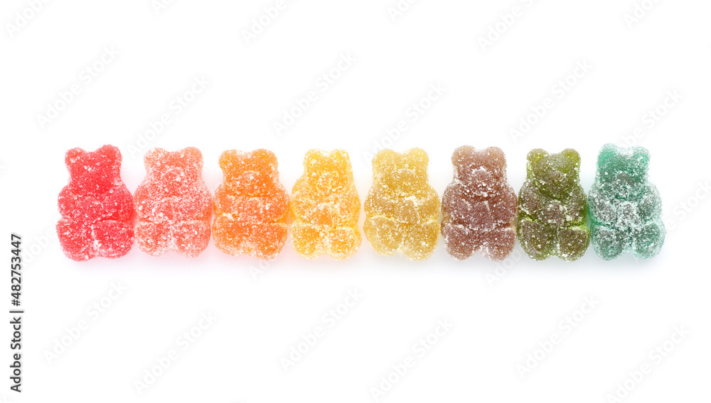 Multicolored jelly bears on white background