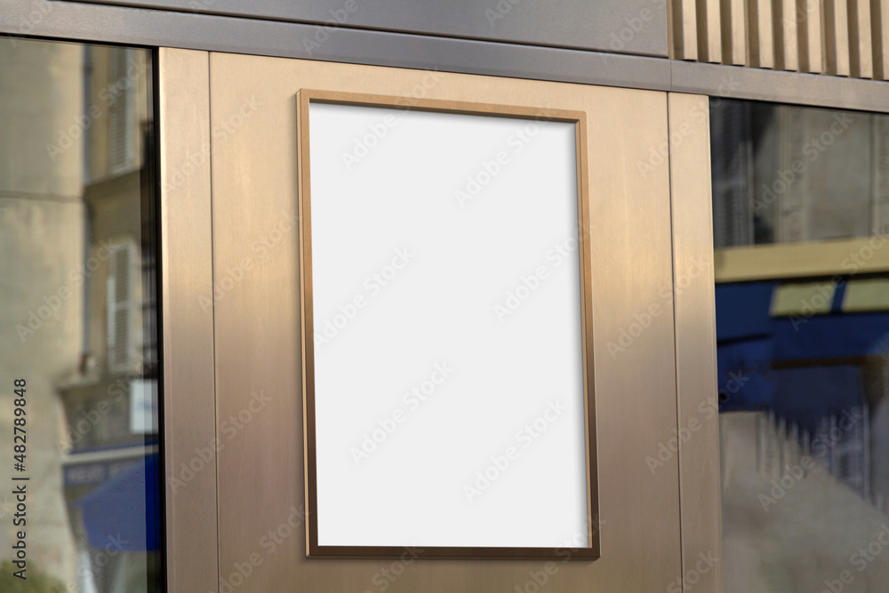 Metal frame hanging in street mockup. Template of a billboard on a wall bathed in sunlight 3D render