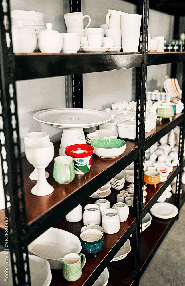 Come help yourself to sale items. Cropped shot of a potters ceramic collection neatly arranged on a