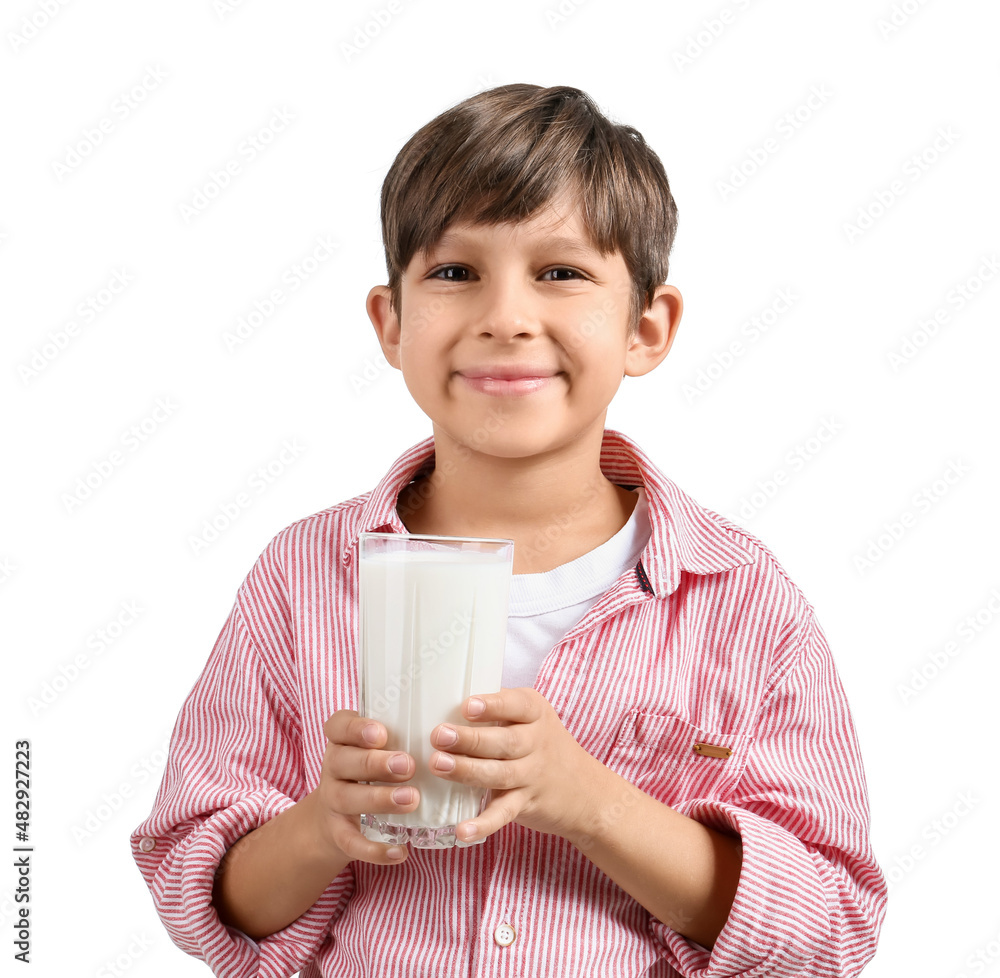 Little boy with glass of milk on white background