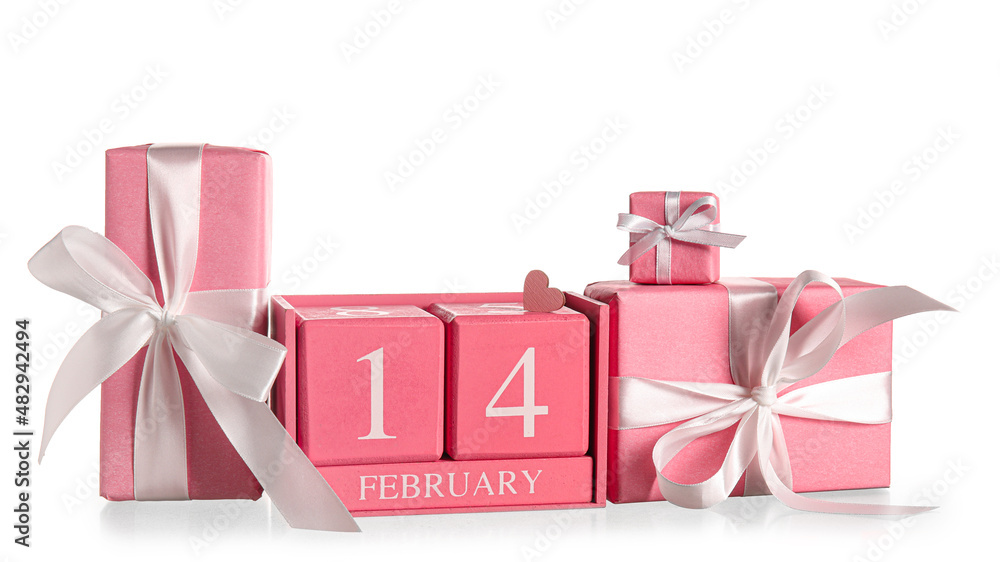 Calendar with date of Valentines Day and gift boxes on white background