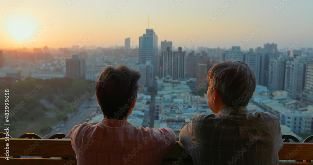 senior couple looking outside