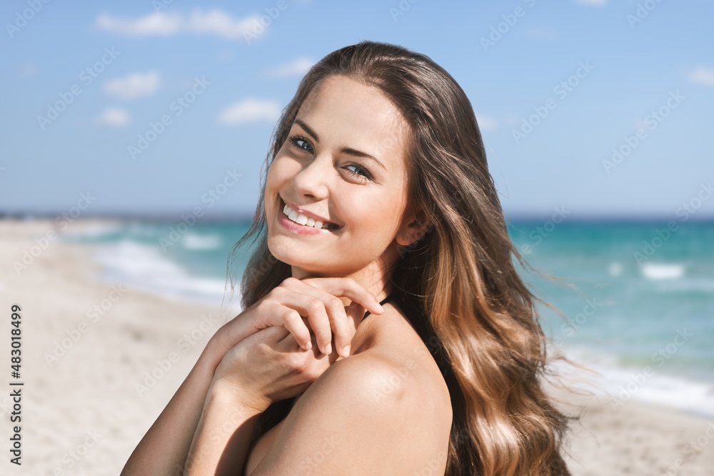 Happy woman with a beautiful face with clean fresh smooth skin.