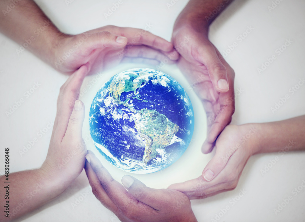 Together we can save our planet. A cropped view of human hands encircling the planet to protect it.