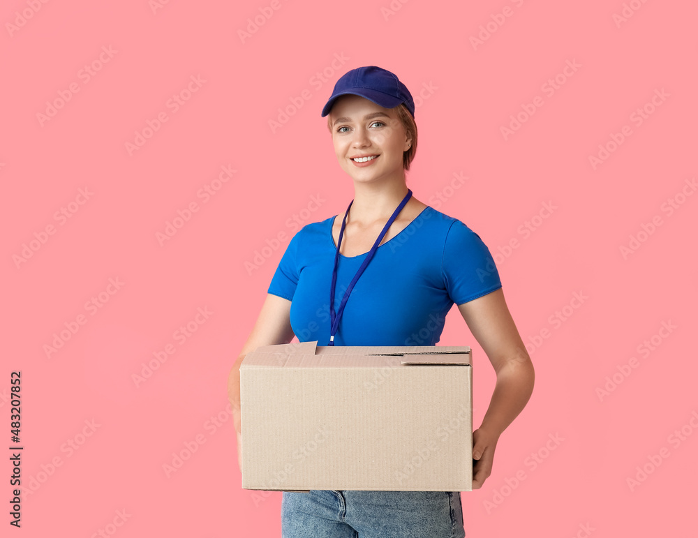 Female courier with parcel on color background