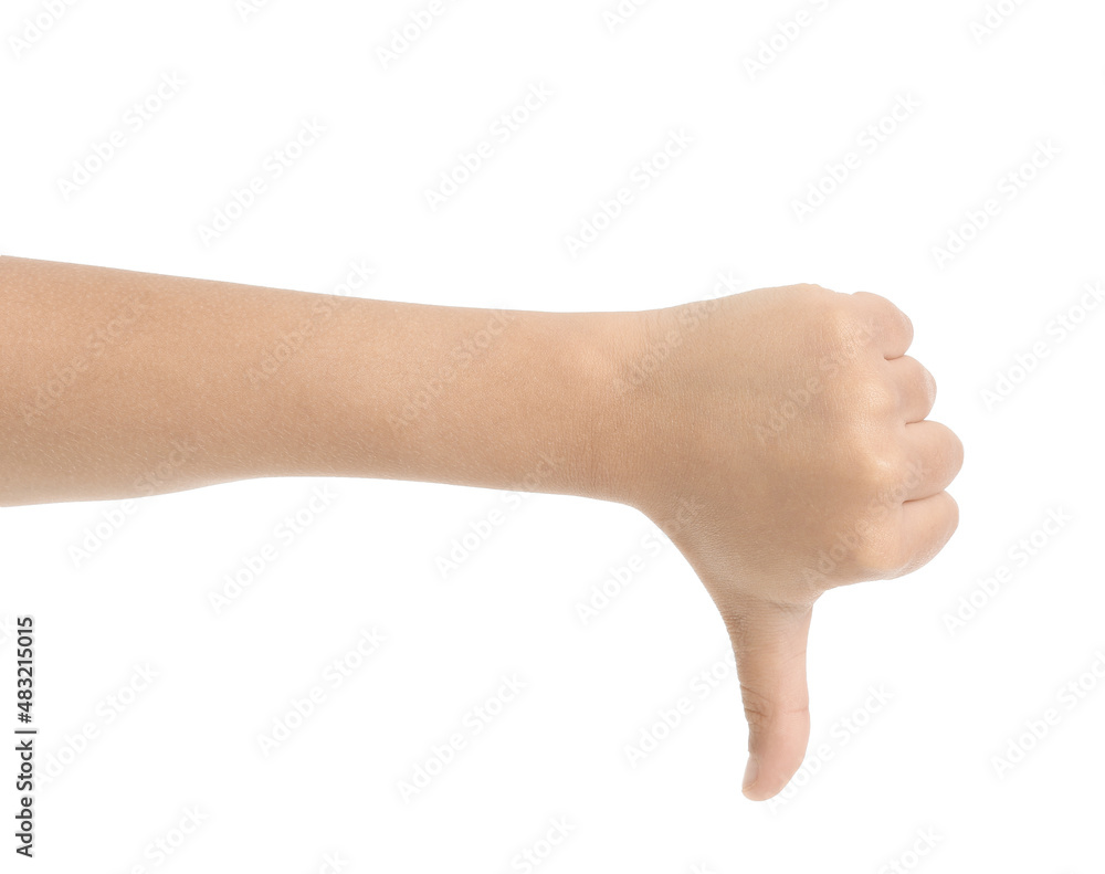 Child showing thumb-down on white background