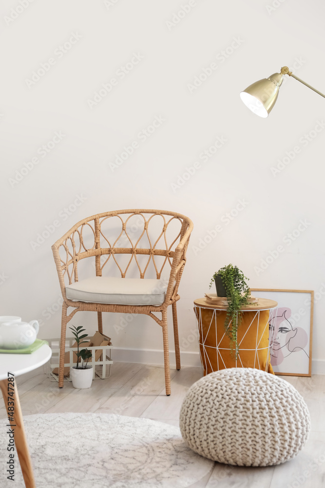 Wicker chair in interior of light living room