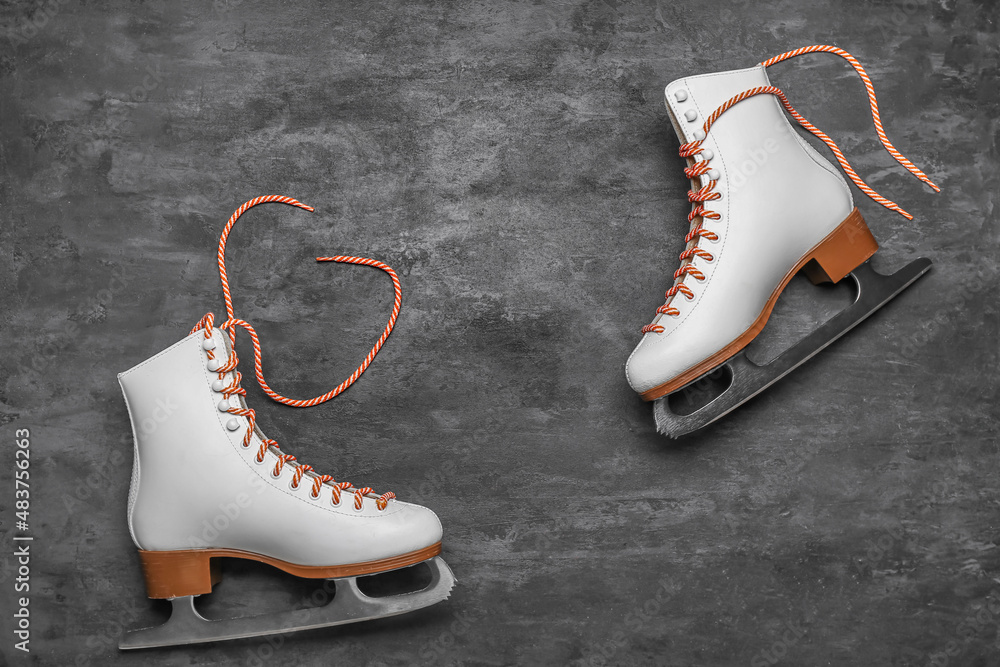 Ice skates on dark background