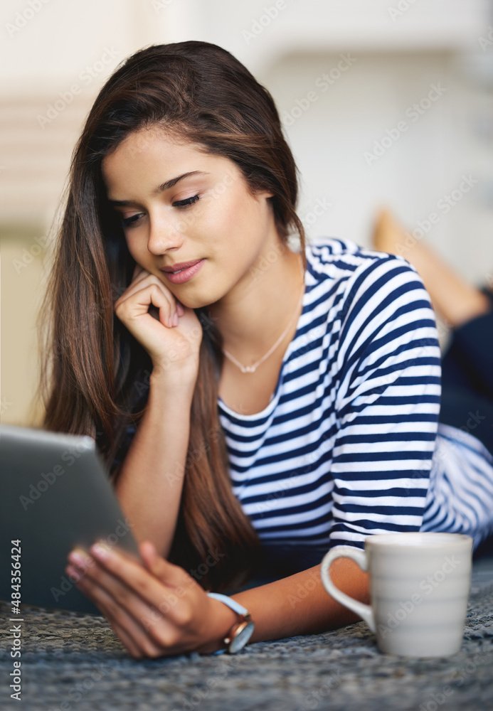 Taking it easy at home with her tablet