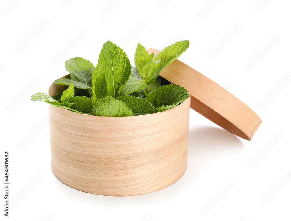 Wooden box with mint on white background