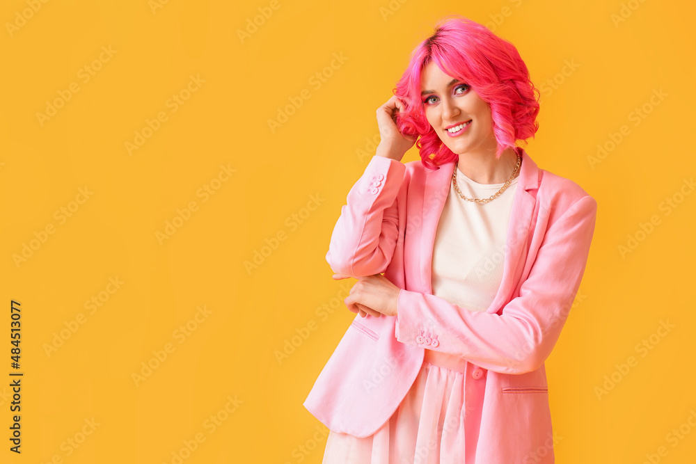 Stylish woman with bright hair on color background