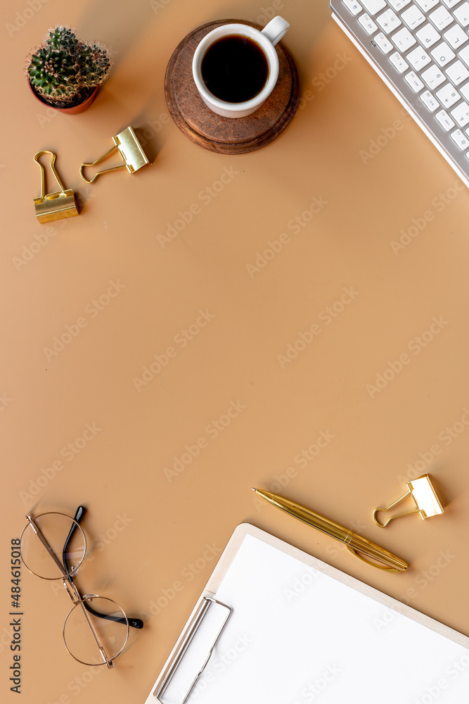 Top view of office working place with computer and cup of coffee