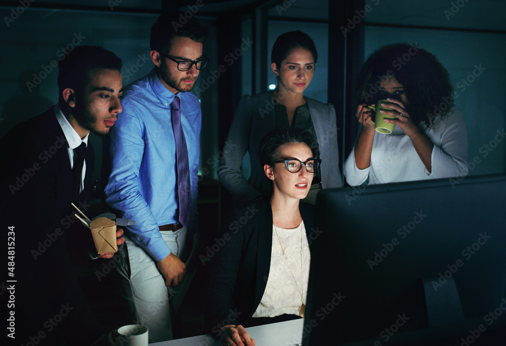 Theyre a team of overachievers. Cropped shot of a diverse group of businesspeople gathered around a 