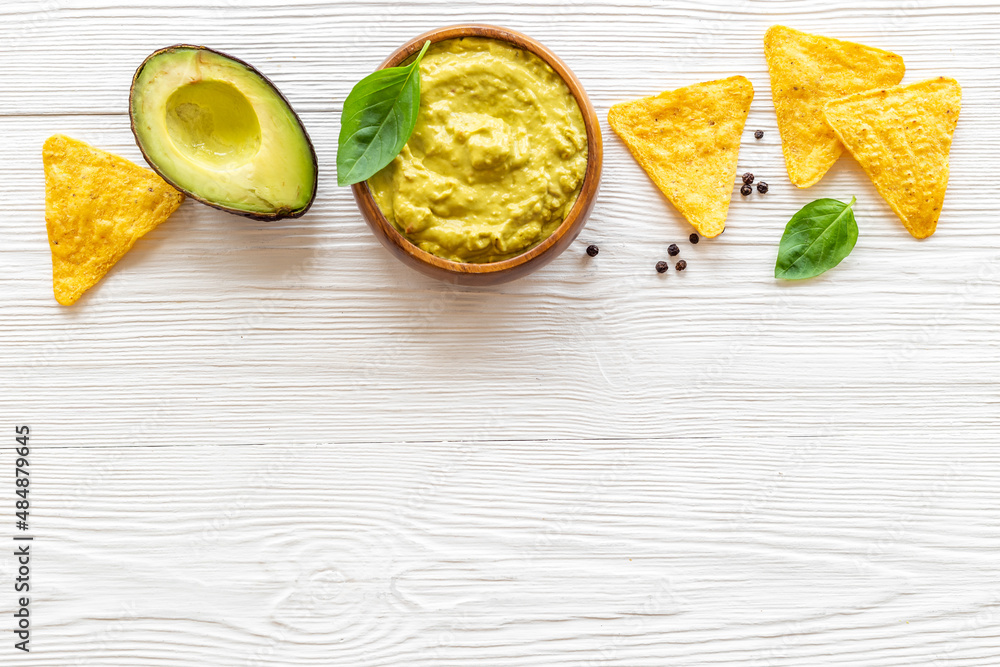 Guacamole sause with avocado and nachos chips