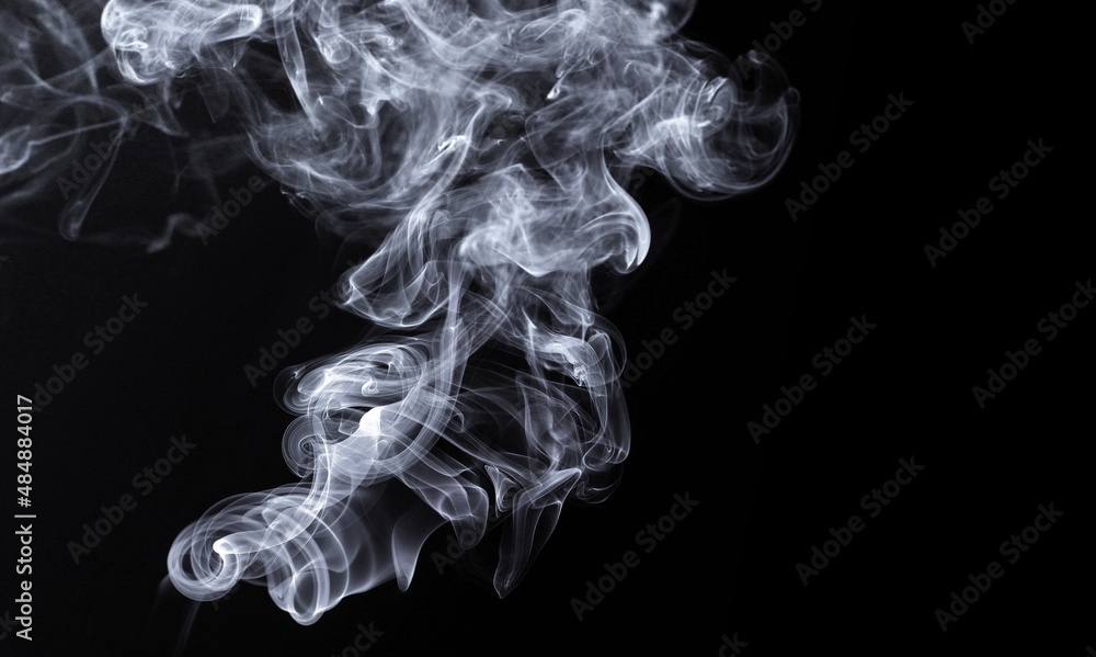 Abstraction created with white smoke on a black background.