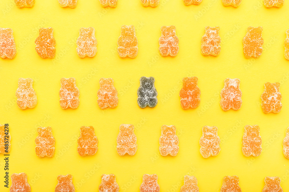 Tasty jelly bears on color background