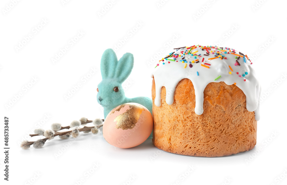 Delicious Easter cake, egg and pussy willow branches on white background