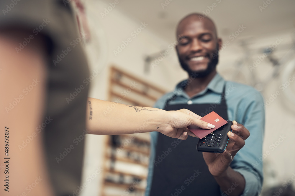 We really appreciate your support. Shot of a handsome young man standing in his bicycle shop and ass