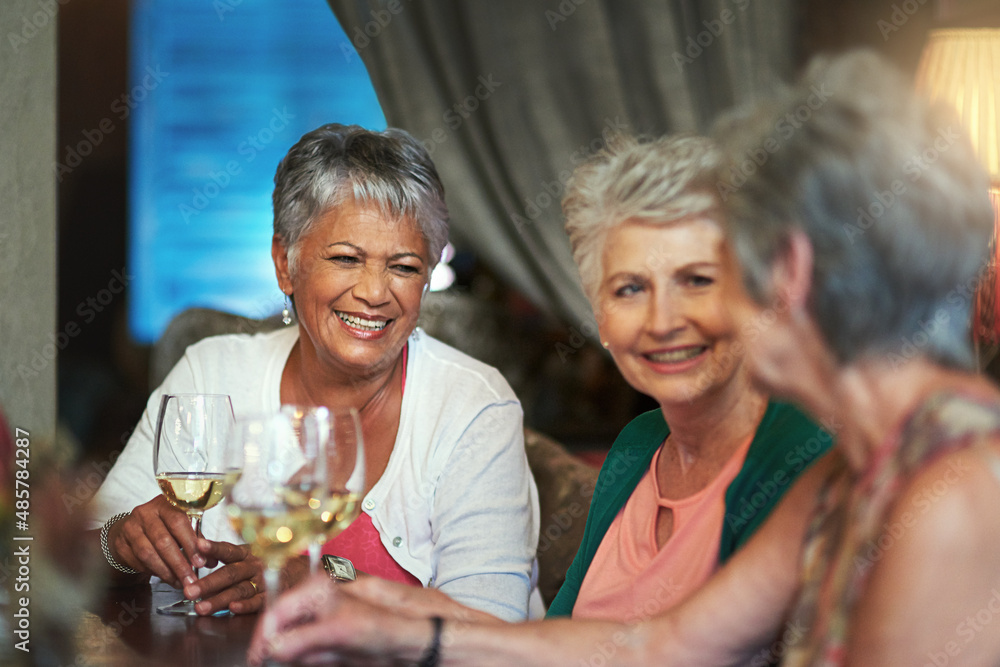 Its always a good time when they get together. Cropped shot of a group of senior female friends enjo