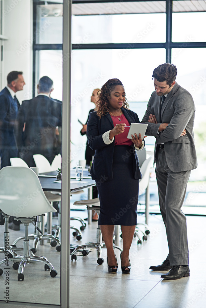 Ironing out the details. Shot of corporate businesspeople meeting in the boardroom.