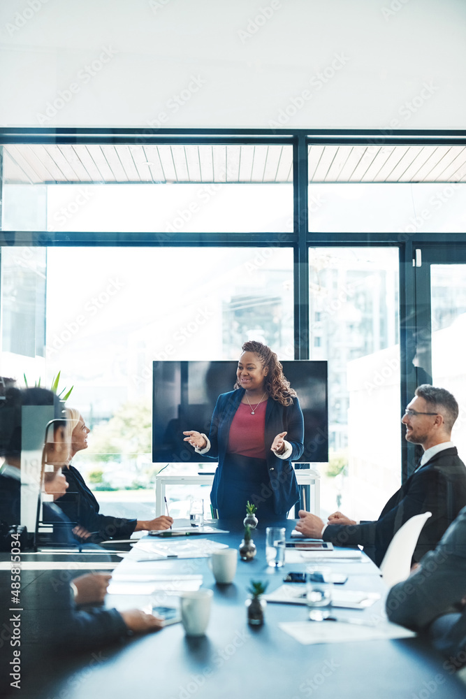 Thats right. Cropped shot of an attractive young businesswoman giving a presentation in the boardroo