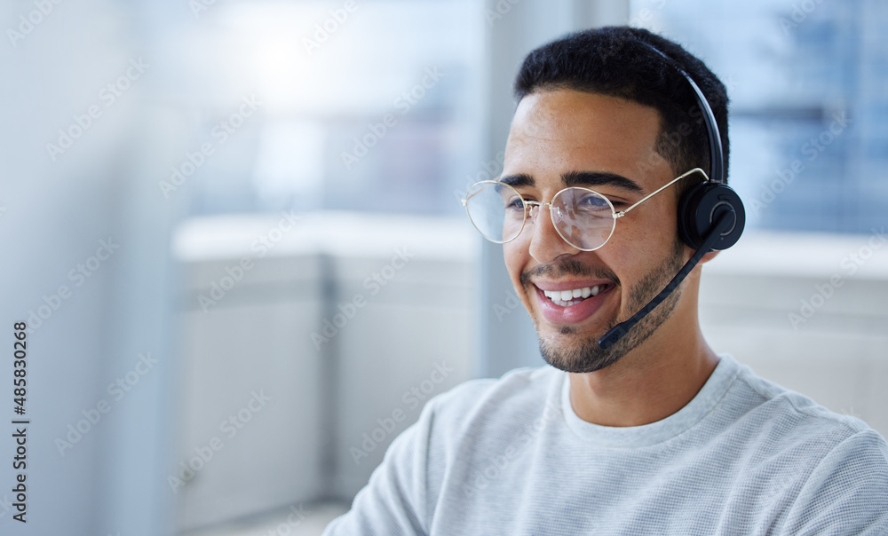 Today is a great day to be productive. Shot of a young businessman working at his desk in his office