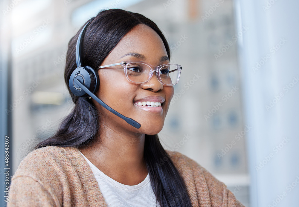 Today feels like its going to be a great day. Shot of a businesswoman sitting at her desk in a call 