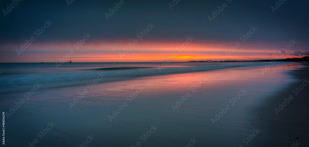 Beautiful sunrise on the Baltic Sea beach in Sopot. Poland