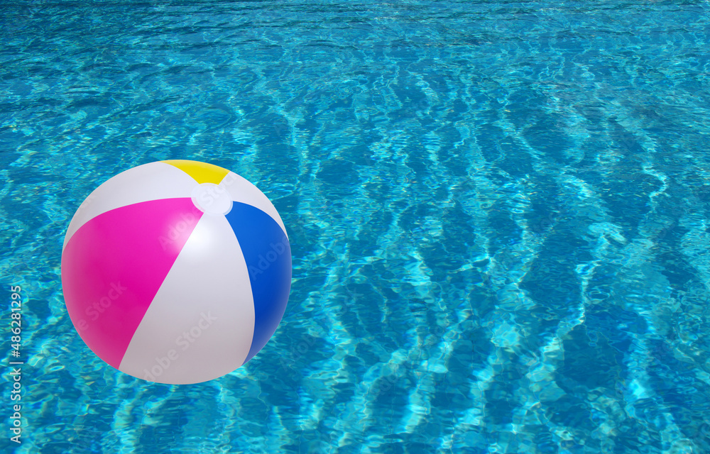 Beach ball in swimming pool