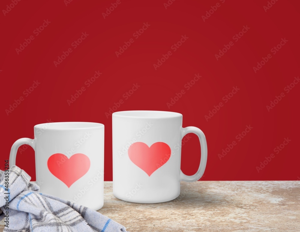 Cups full of love.  A hot heart in a tender embrace. Perfect texture for a greeting card for a loved