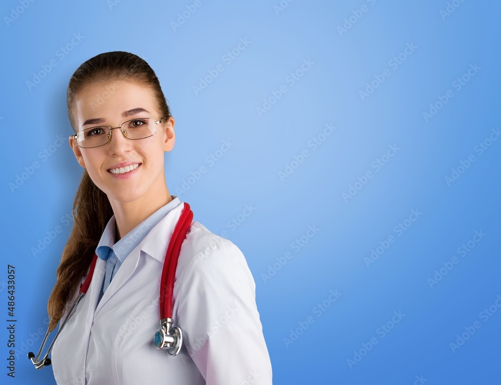 Beautiful young doctor, with a book for records. Medical student general practitioner.