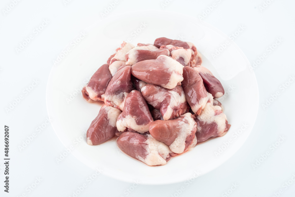 A plate of fresh chicken hearts