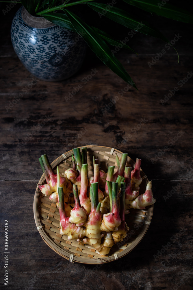 Bamboo sieve filled with fresh tender ginger