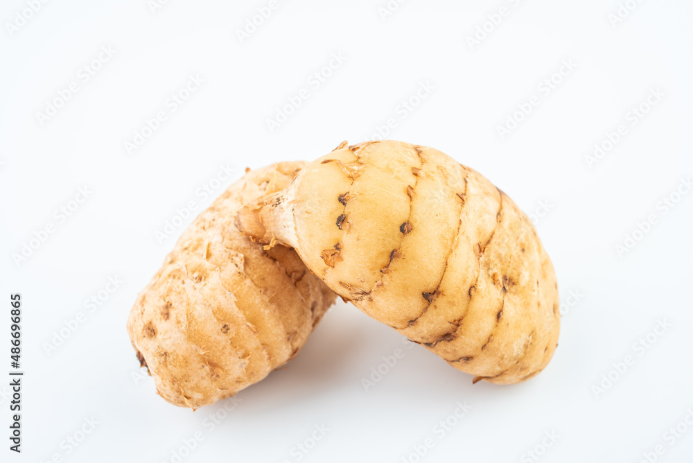 Fresh Gastrodia elata with Chinese herbal medicine on white background