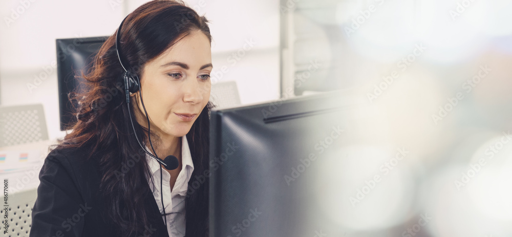 Business people wearing headset working in office to support remote customer or colleague. Call cent