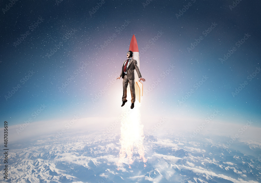 Business person in aviator hat flying on rocket