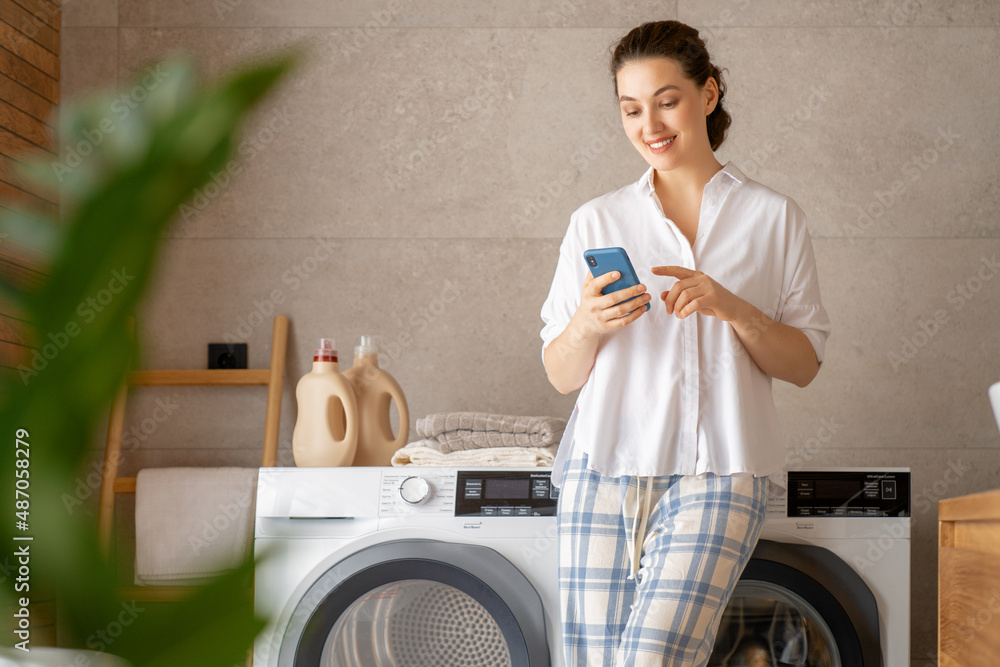 woman is doing laundry