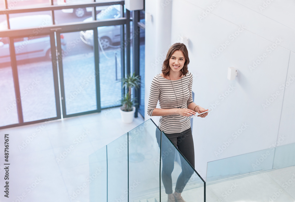 Fast internet speed for a fast business pace. Shot of a young businesswoman using a digital tablet o