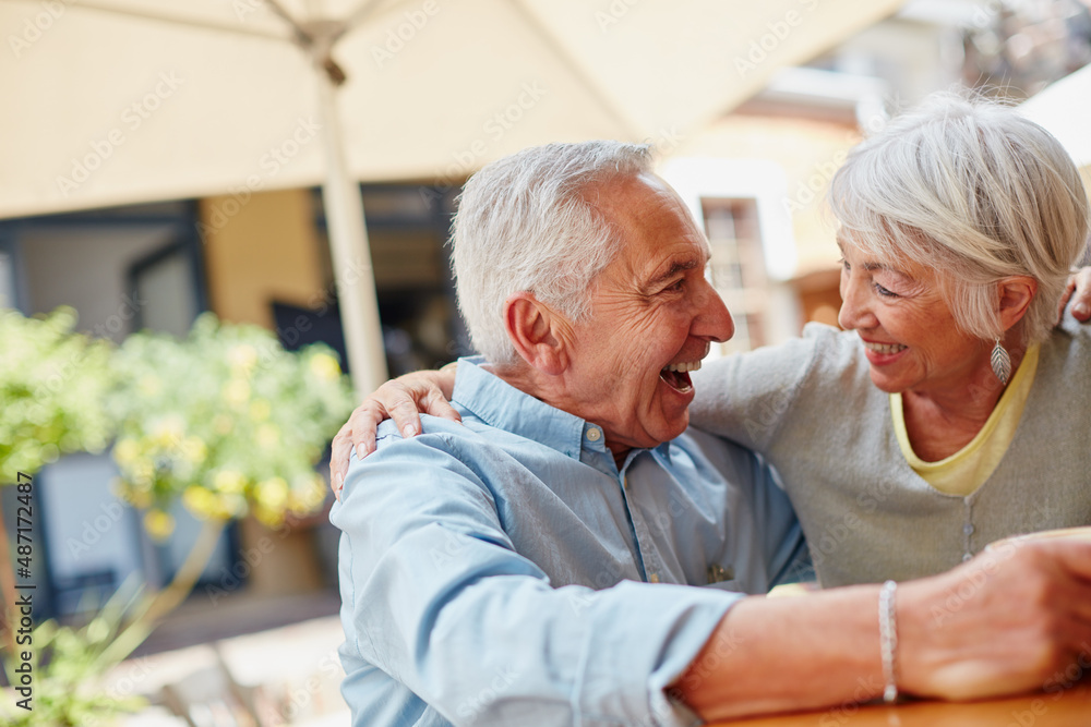 Who says fun is only for the young. Shot of a happy senior couple spending time together at a cafe.