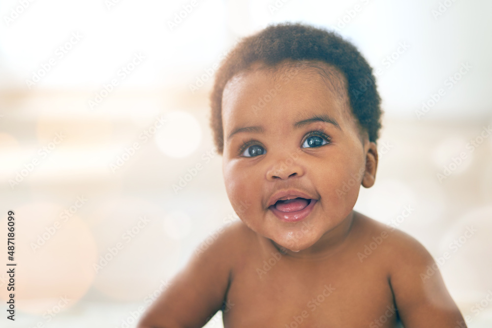 The queen of cuteness. Shot of an adorable baby girl at home.