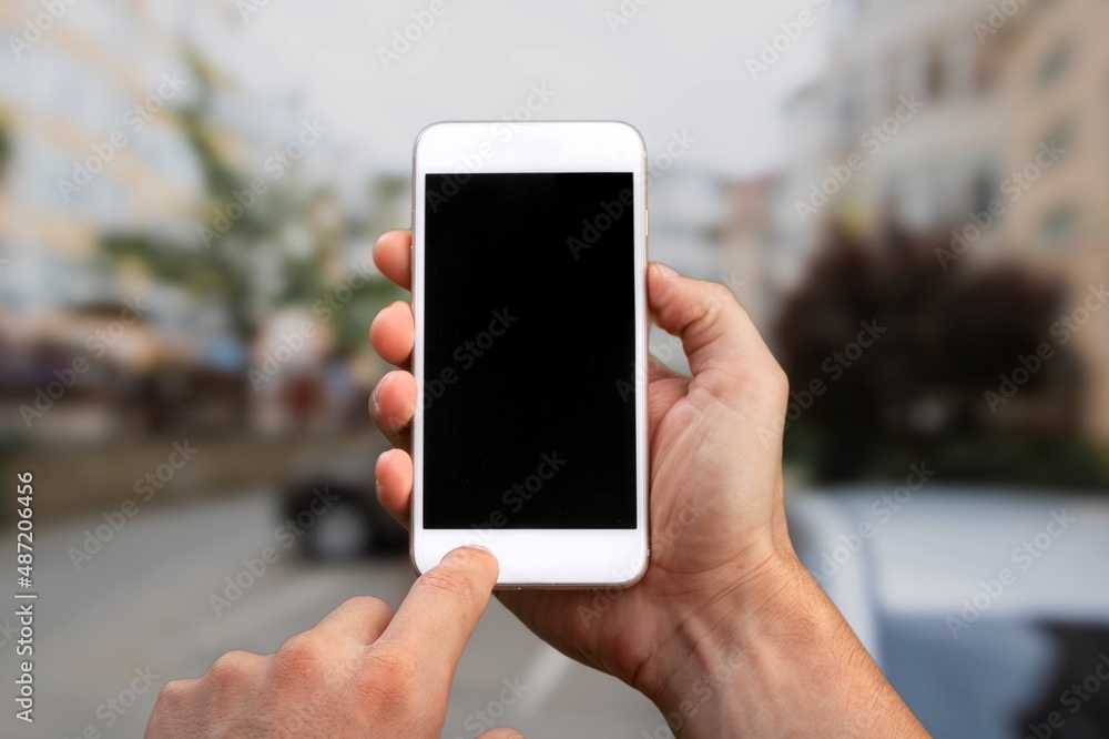 Hand with smartphone with empty blank screen