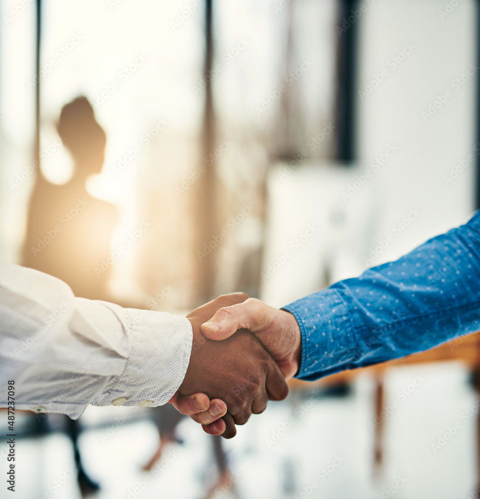 Aspiring to greatness together. Closeup shot of businesspeople shaking hands in a office.